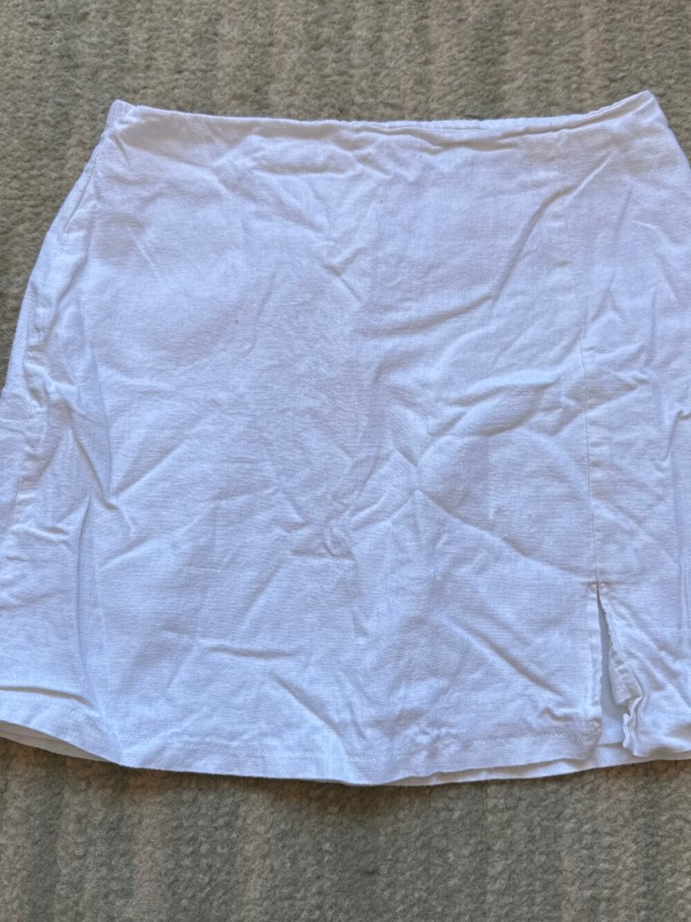 White linen mini skirt with side slit